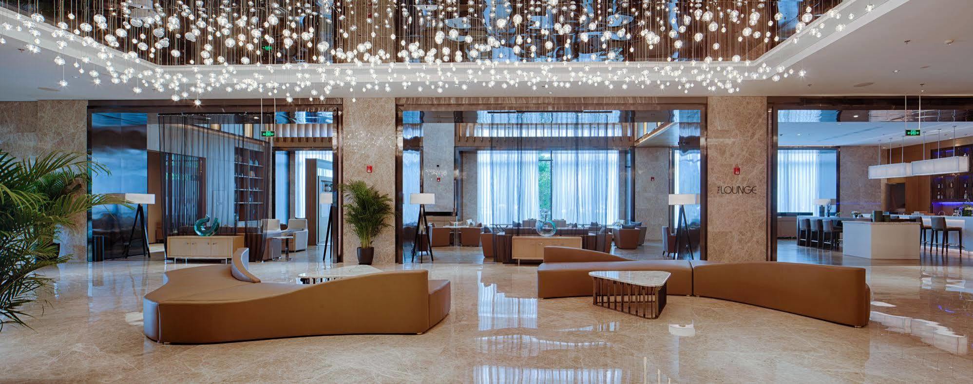 คอร์ตยาร์ด ซินฉาง Hotel Xinchang ภายนอก รูปภาพ